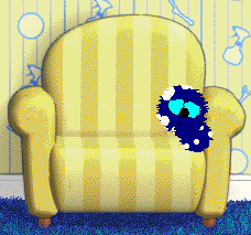 Bluescreen sits calmly in a yellow striped chair.